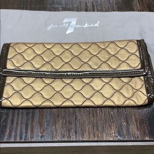 7 for all mankind metallic and brown clutch